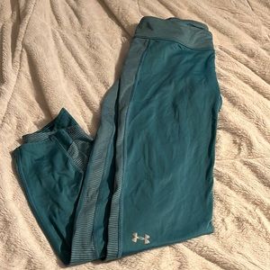 Under Armour teal leggings - Size L - little strips down the side